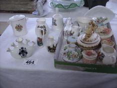 A quantity of crested china and trinket boxes