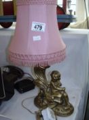 A cherub table lamp