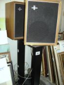 A pair of hi fi speakers on stands