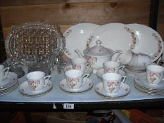 A shelf of china tea ware etc