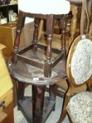 An oak cricket table and a stool
