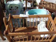 3 children's toys including swinging crib