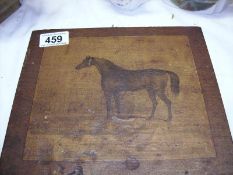 A picture of horse on wood