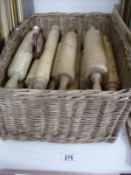 A basket of wooden rolling pins