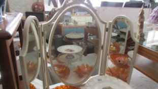 A triple dressing table mirror