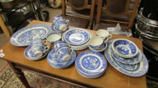 A quantity of blue and white tea ware