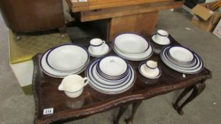 A quantity of dinner ware