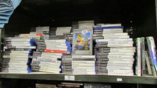 A shelf of in excess of 150 play station games