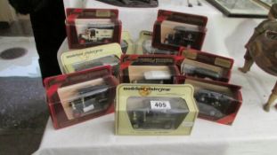 A quantity of boxed die cast commercial vehicles