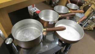 A set of copper pans