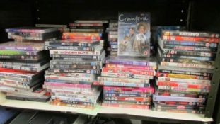 A large quantity of DVD's, one shelf