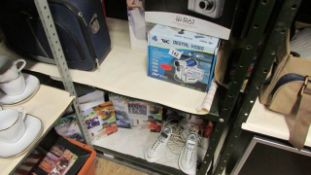 2 shelves of miscellaneous including camcorder, phones etc