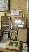 A quantity of picture frames and mirrors