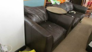 A leather sofa and chair