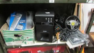 A shelf of computer accessories etc