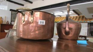 A copper kettle and a copper pan
