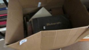 A box of photo albums