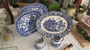 3 blue and white platters and 2 jugs