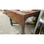 An oak drop leaf table