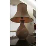 A table lamp with shade