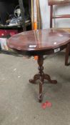 A tripod wine table