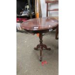 A tripod wine table