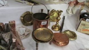 A quantity of copper and brass items
