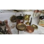 A quantity of copper and brass items