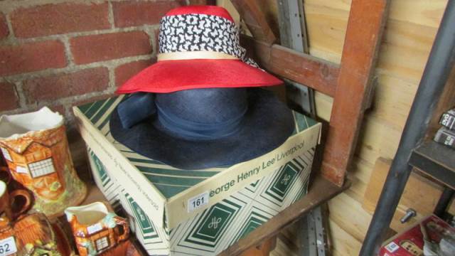 A hat box and hats