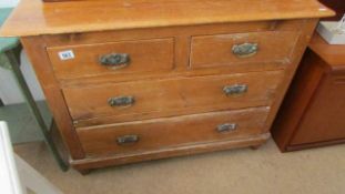 A 2 over 2 pine chest of drawers