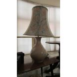 A table lamp with shade