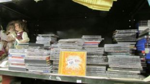 A large quantity of CD's, one shelf