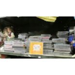 A large quantity of CD's, one shelf