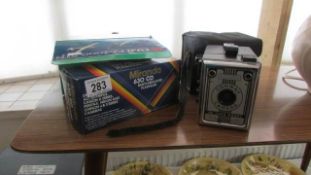 A Conway camera, a Fuji camera and a flashgun