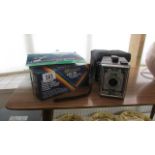 A Conway camera, a Fuji camera and a flashgun