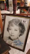 A framed and glazed signed photograph of Glynis Johns