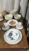 A quantity of Poole and other dinner ware