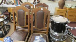 A set of 4 oak dining chairs
