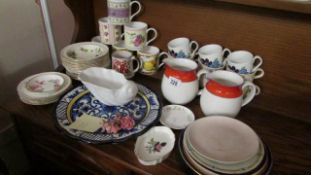 A mixed lot of china including mugs