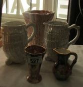 A pair of lustre jugs and 3 other items