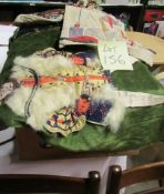 A box of assorted linen including embroidered items