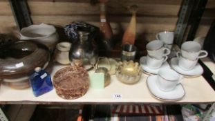 A shelf of miscellaneous china etc