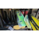 A quantity of wellington boots, flippers etc