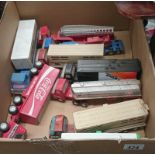 A box of Tonka articulated lorries inc. Coca Cola etc.