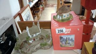 A boxed Lilliput Lane High Ghyll Farm and a boxed Cats Coombe cottage