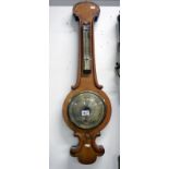 A Victorian mahogany wheel barometer by Soldini Hull