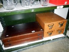A c1930 two drawer cabinet from a Grimsby drapers shop plus assorted related ephemera and a vintage