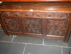 A period carved oak coffer