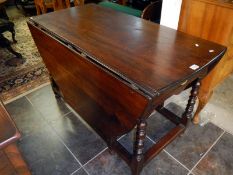 A period walnut gateleg table