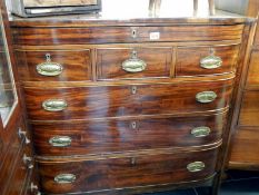 A Victorian mahogany cross banded bow front chest of drawers